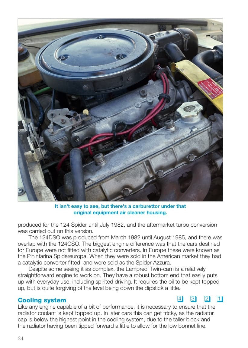 Engine bay of a classic convertible sports car shown on a book page