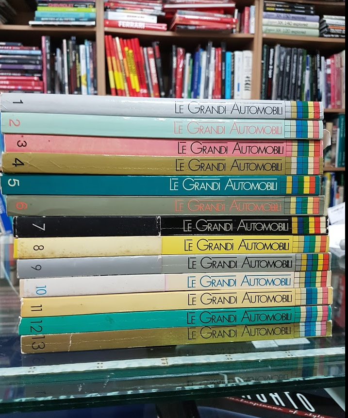 Le Grandi Automobili book set with multicolor spines in a stack