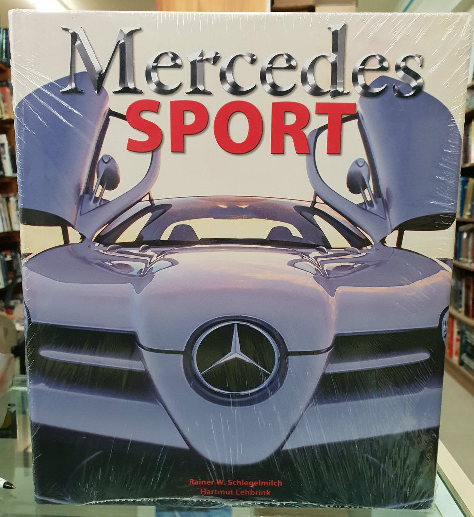 Mercedes Sport hardcover book with large title on front cover and blue car