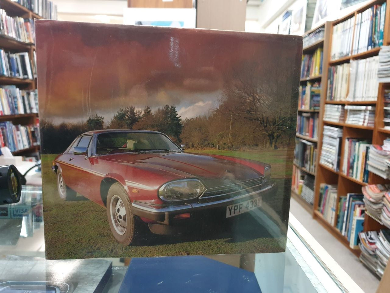 Classic Cars Jaguar printed cover with maroon coupe and trees landscape