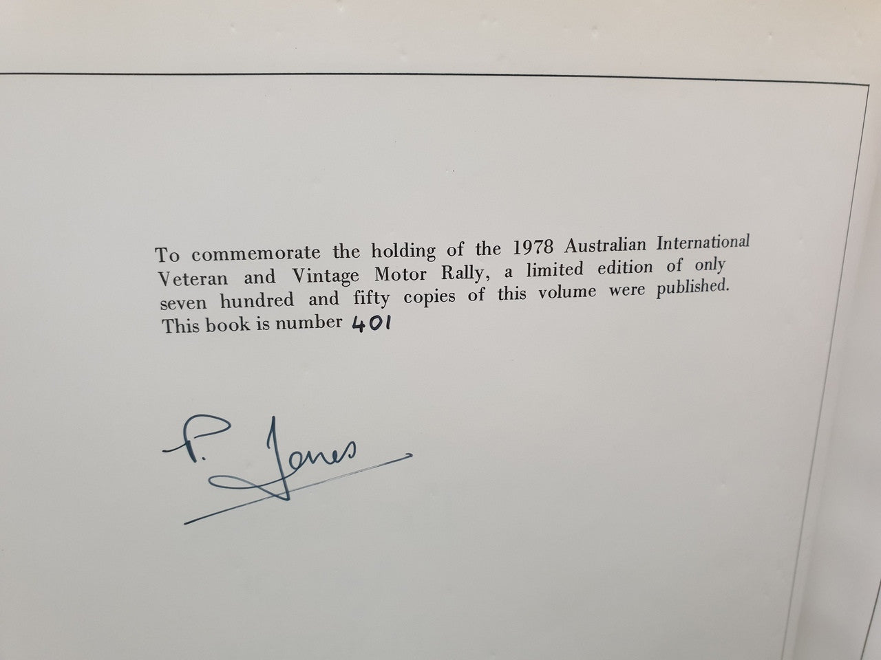 Signed limited edition book page with handwritten signature