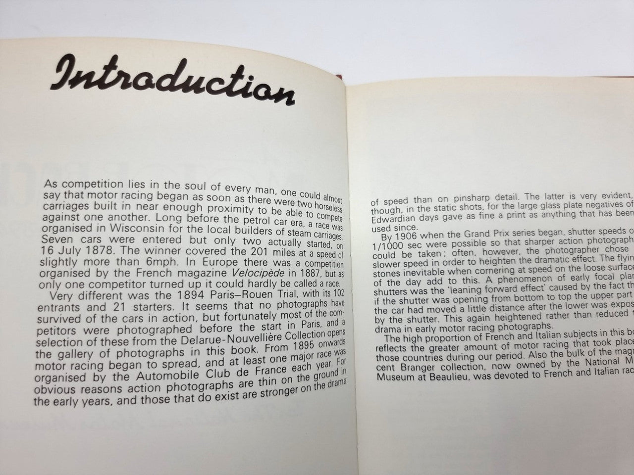Open hardcover book page titled "Introduction" with paragraph text blocks