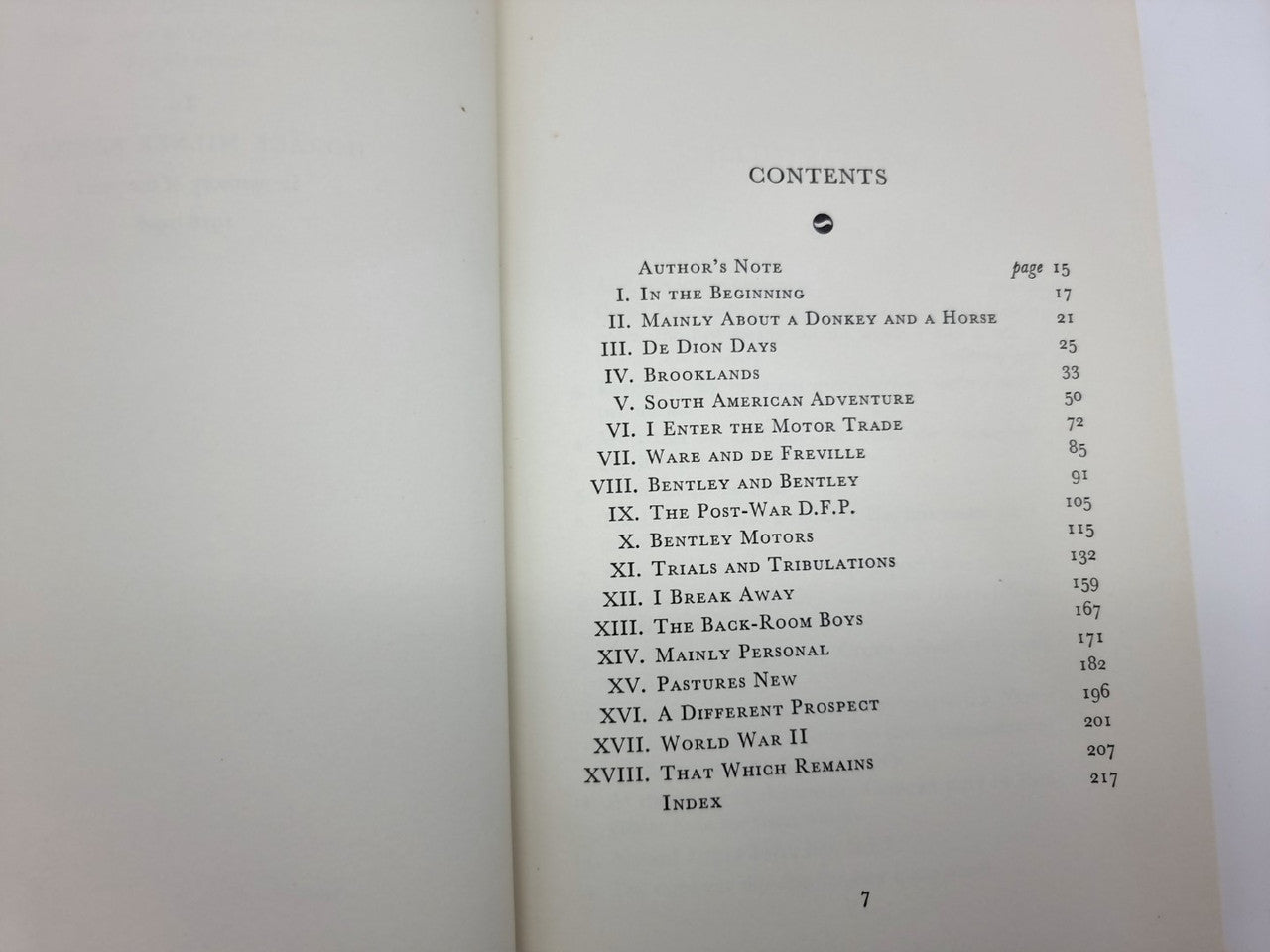 Softcover book open to the Contents page with numbered sections in black text.