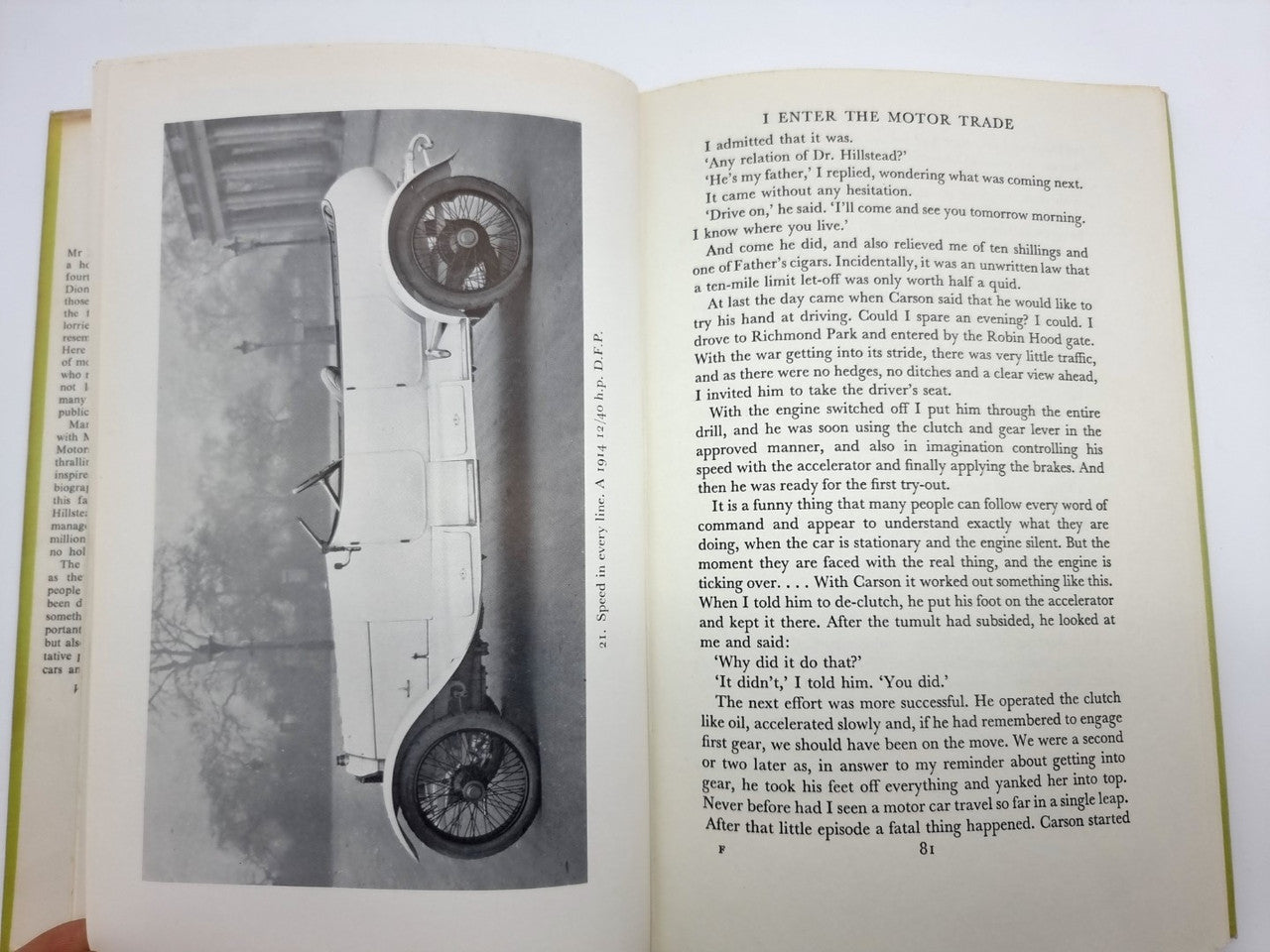 Book open to a motor trade text page with vehicle diagram