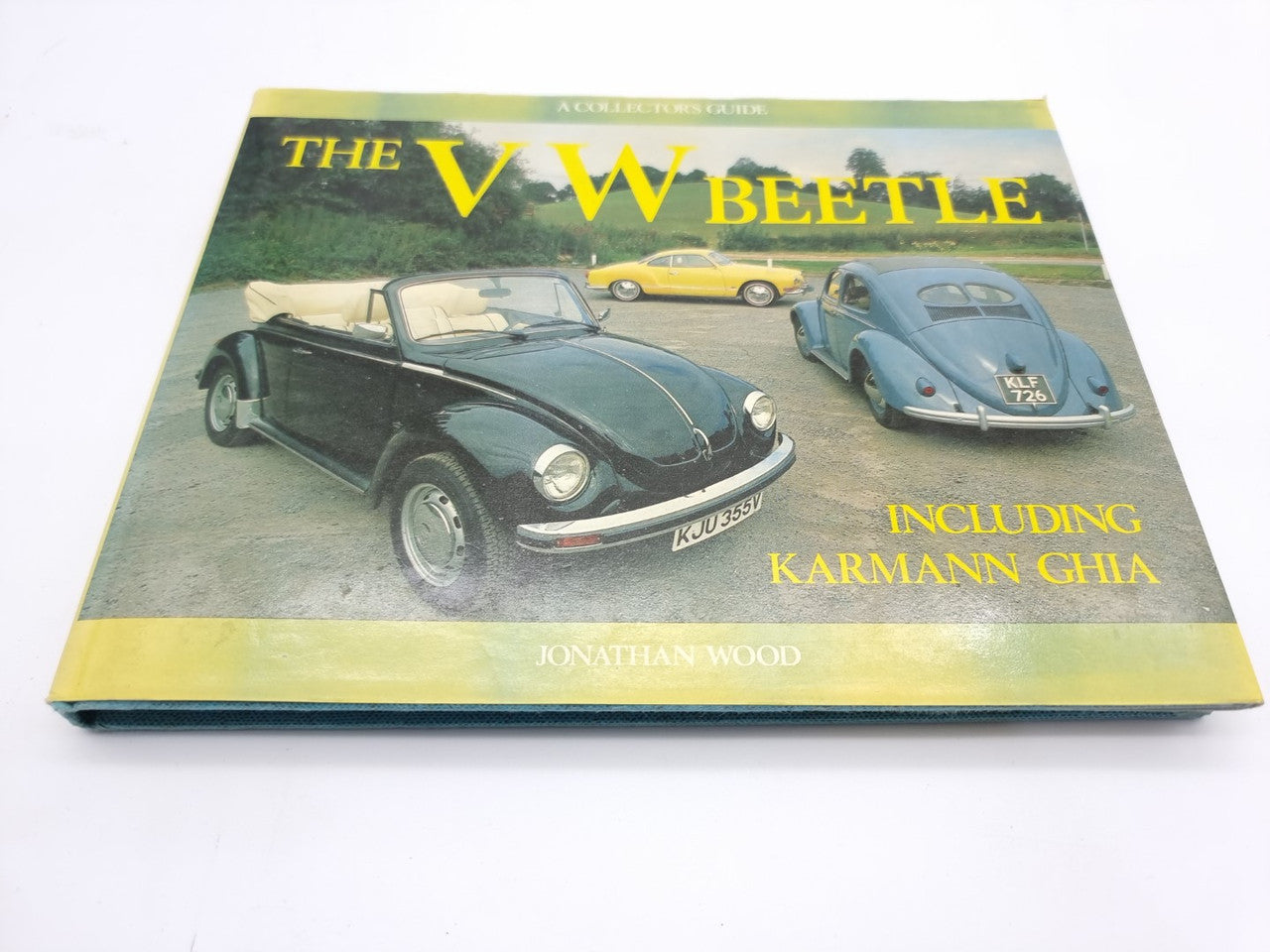 Collector's guide book cover with two vintage Beetle cars and yellow title text.