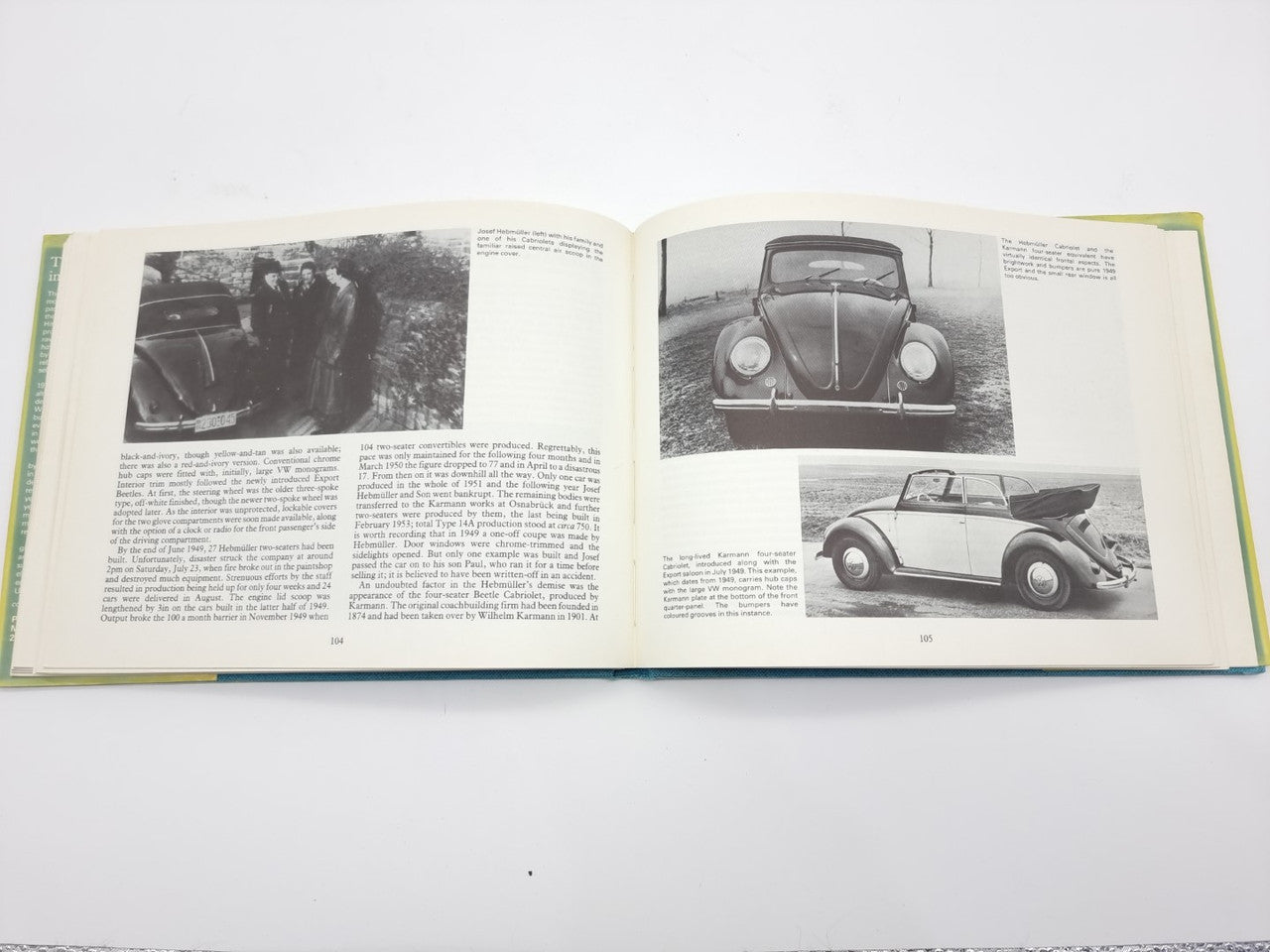 Volkswagen Beetle guidebook open, front and side car photos with captions