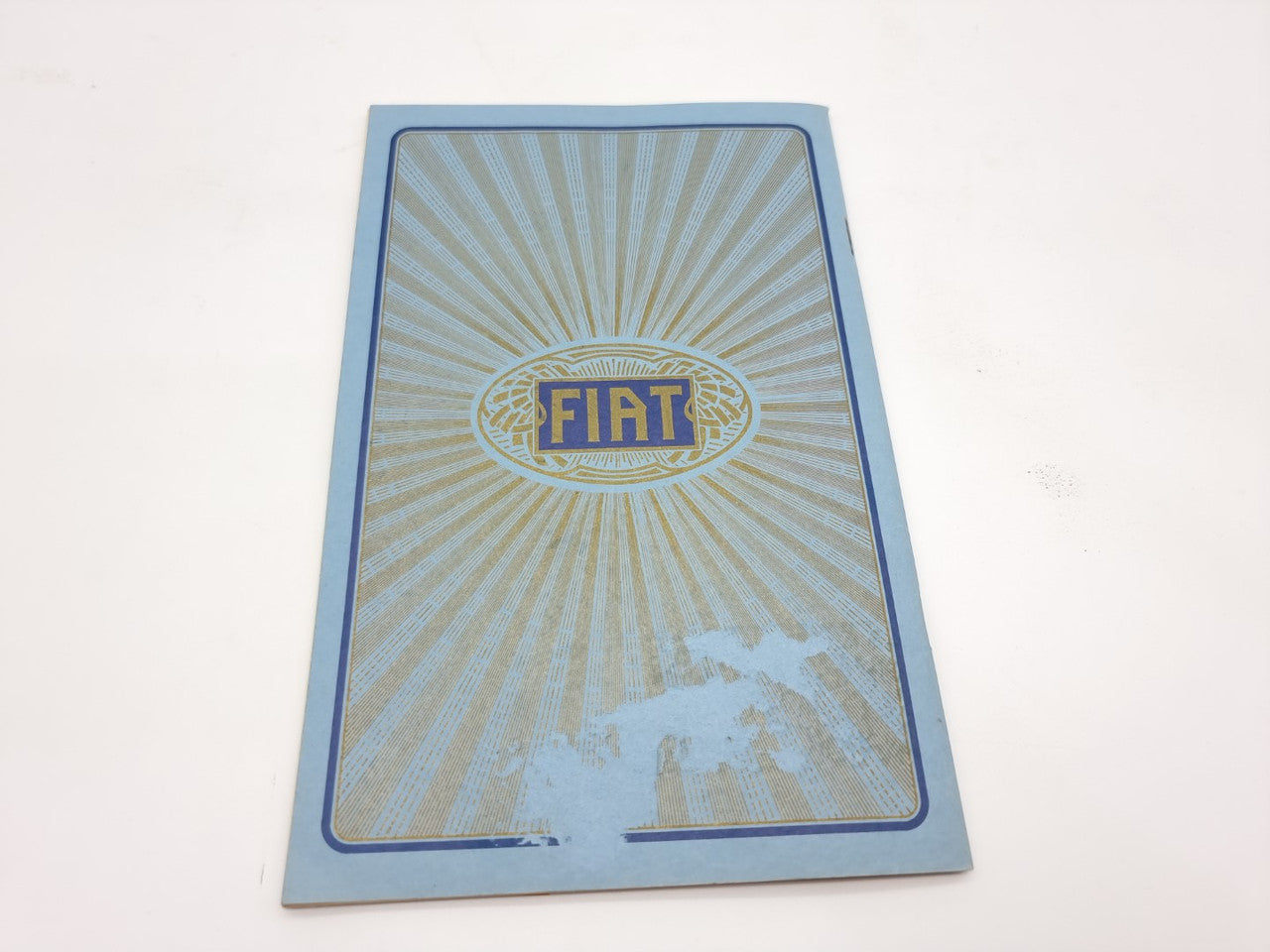 Fiat souvenir catalogue reprint, blue cover featuring a Fiat oval emblem