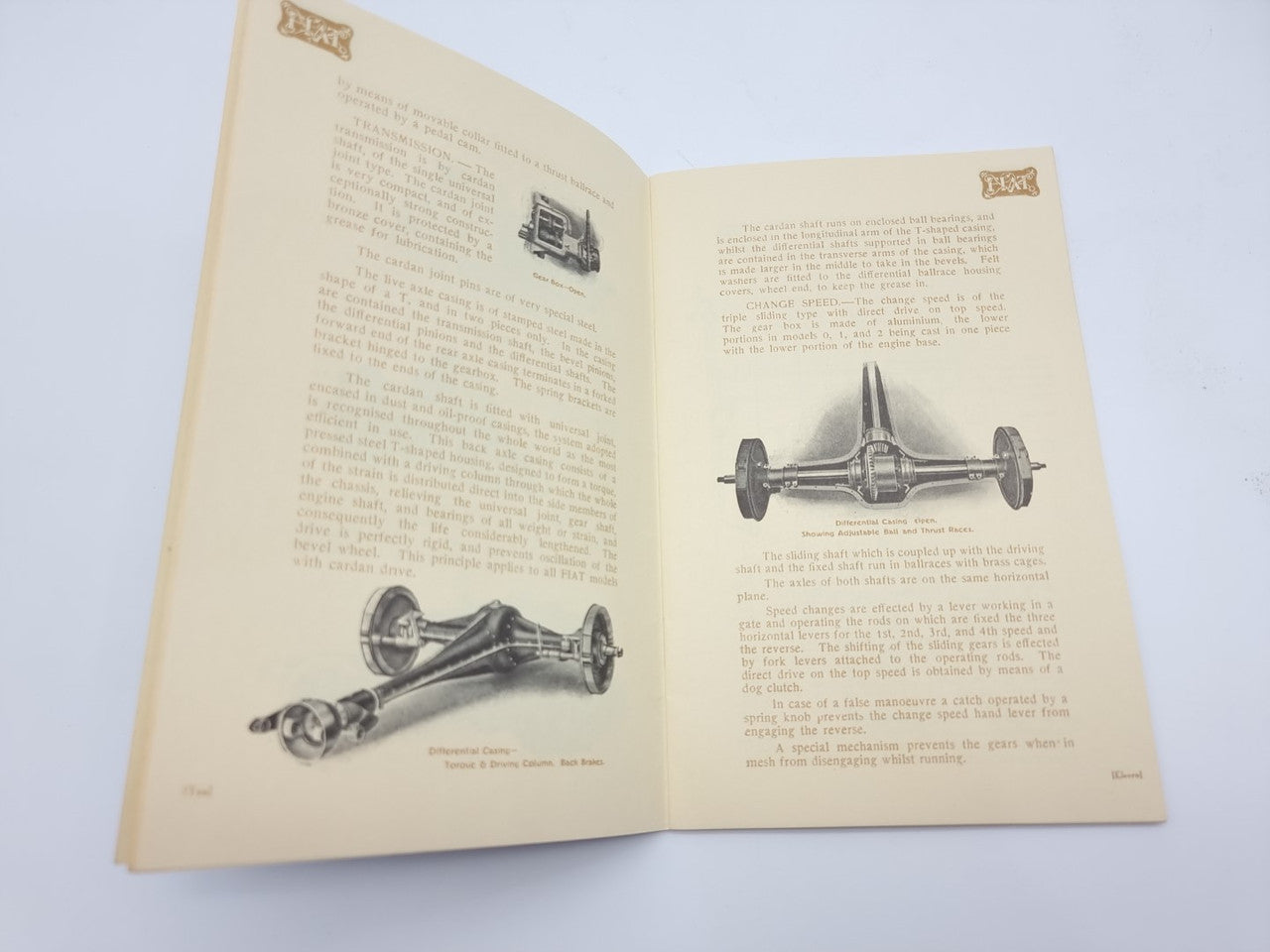 Fiat souvenir catalogue reprint open to pages with car illustrations and block text