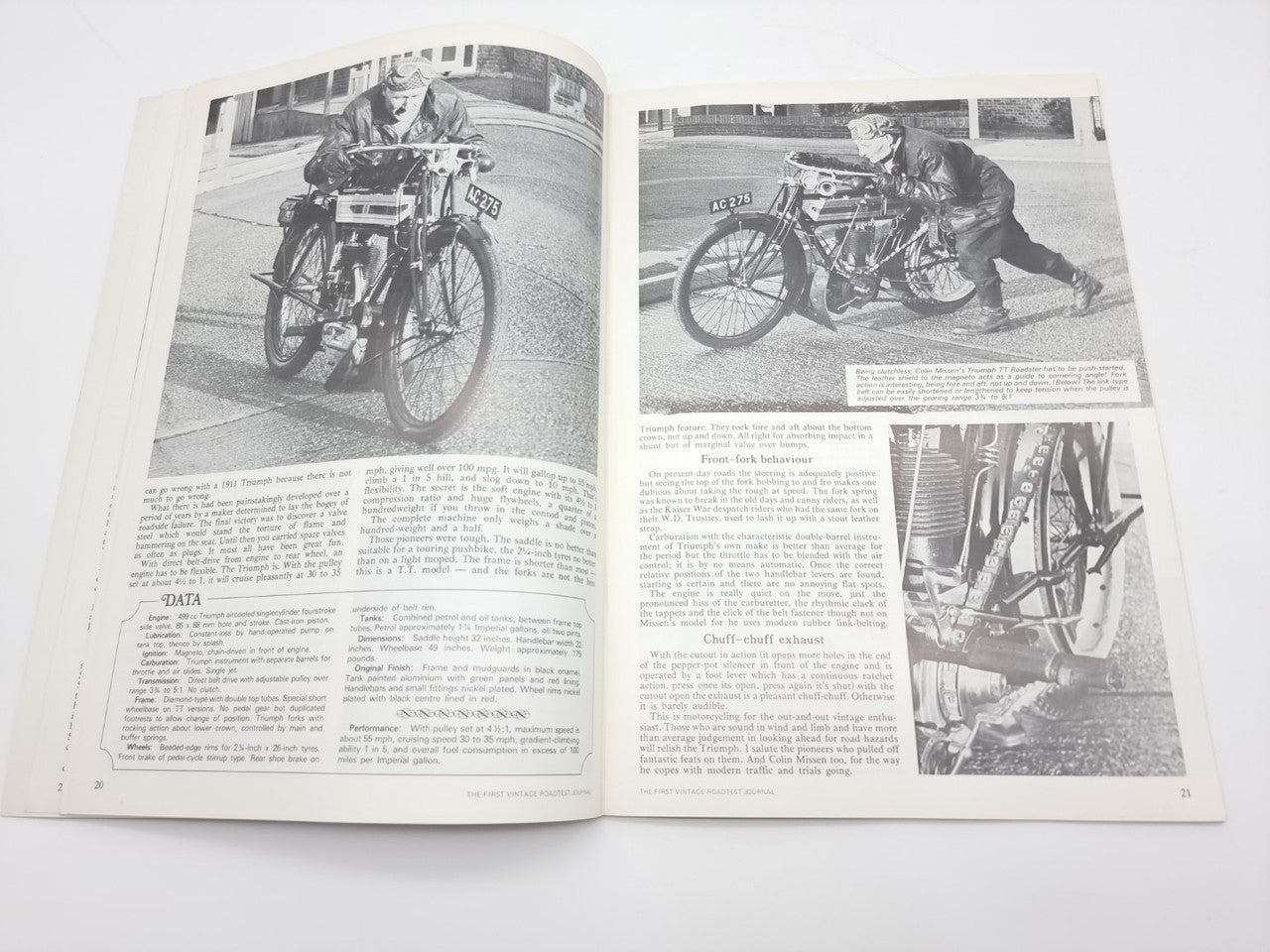 Vintage road test journal open pages with motorcycle photos and technical text