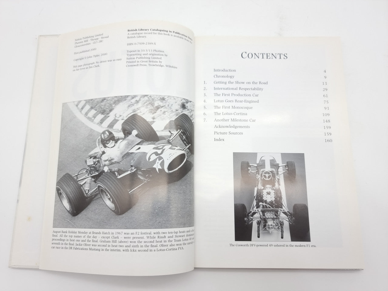 Open book spread showing Contents page and a race car photo on printed paper