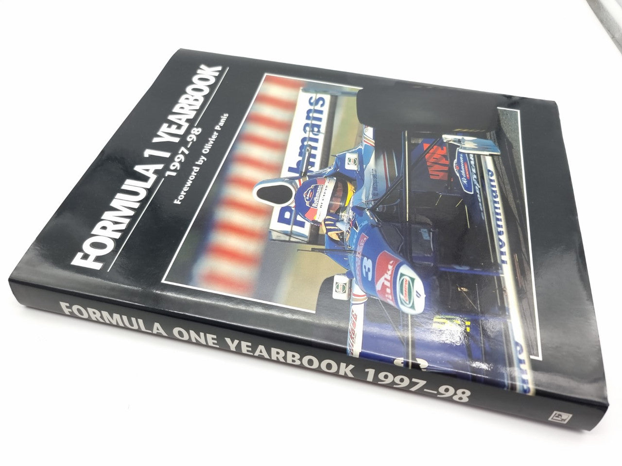Formula 1 yearbook 1997–98 front cover with racing car photo and title