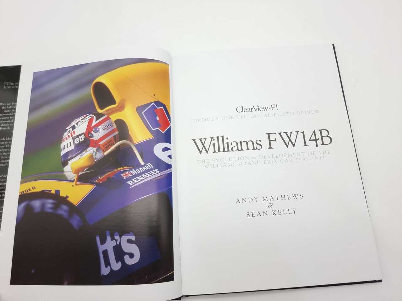 Hardcover motorsport book with car-themed cover and title page