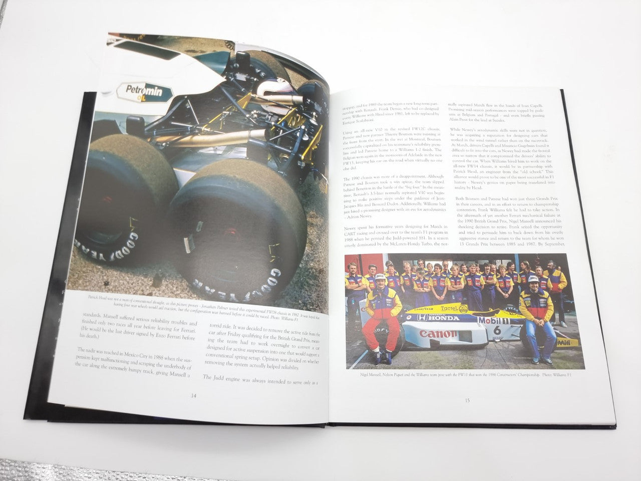 Open photo book spread featuring a close-up race car engine and drivers team photo