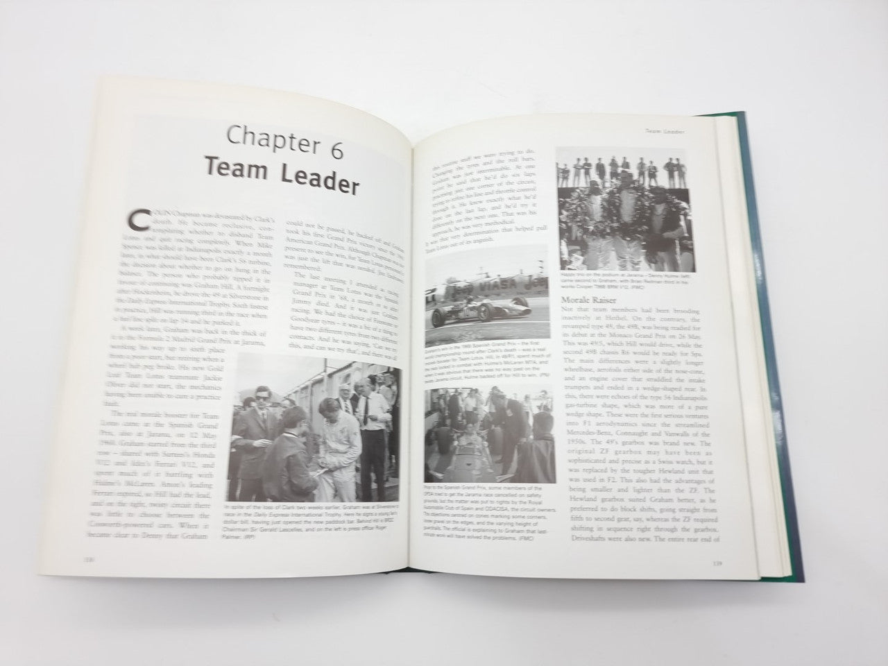 Open motorsport book page titled “Team Leader” with black-and-white photos