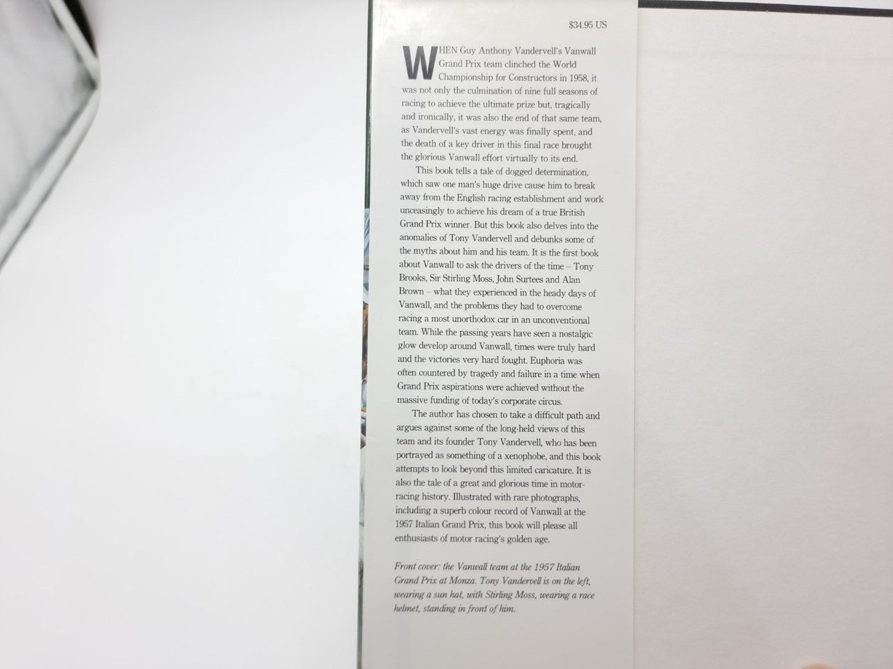 Motorsport book page with dense text and small header graphic on the right