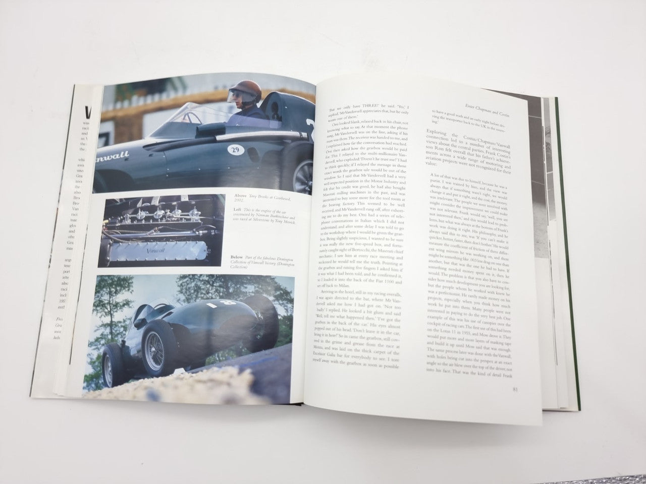 Open motorsport book with blue car photo inset and large text page