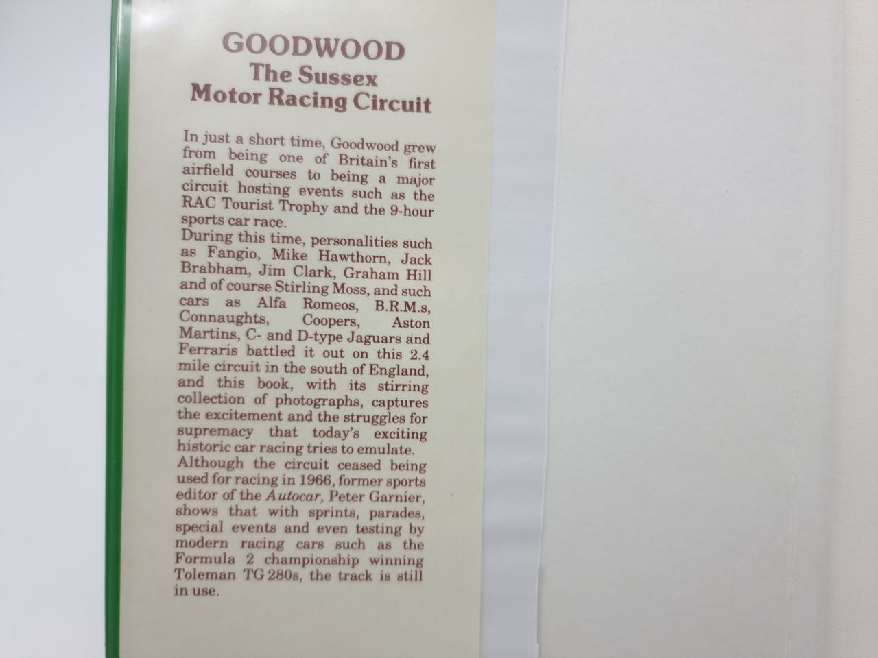 Hardcover book front matter page, dense paragraphs under "GOODWOOD" heading