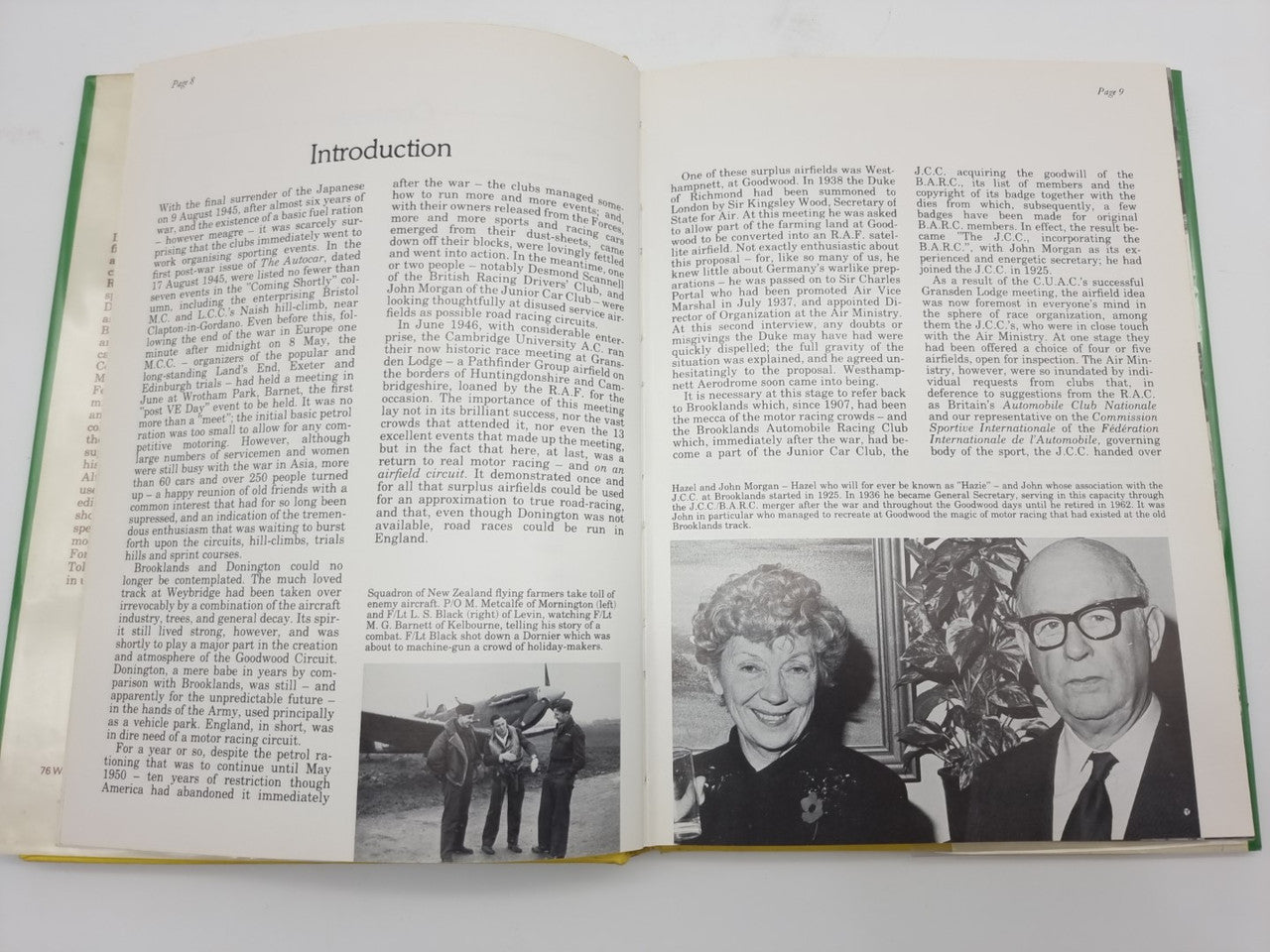 Hardcover book opened to introduction and photo, black-and-white portraits on right page