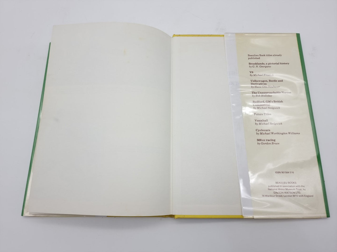 Open hardcover book with mostly blank pages and a printed list on the right.