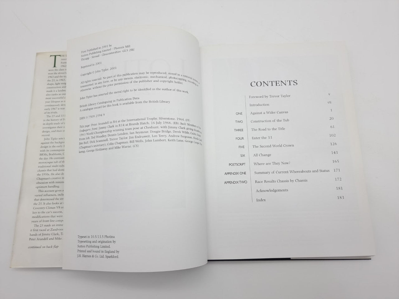 Open Lotus 25 & 33 book with contents list on the right page