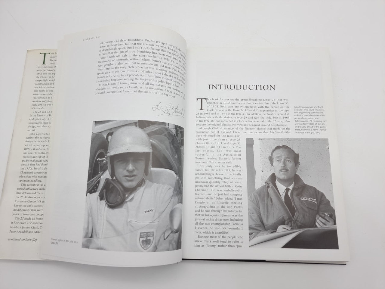 Open book showing introduction section with portrait photo blocks on two pages