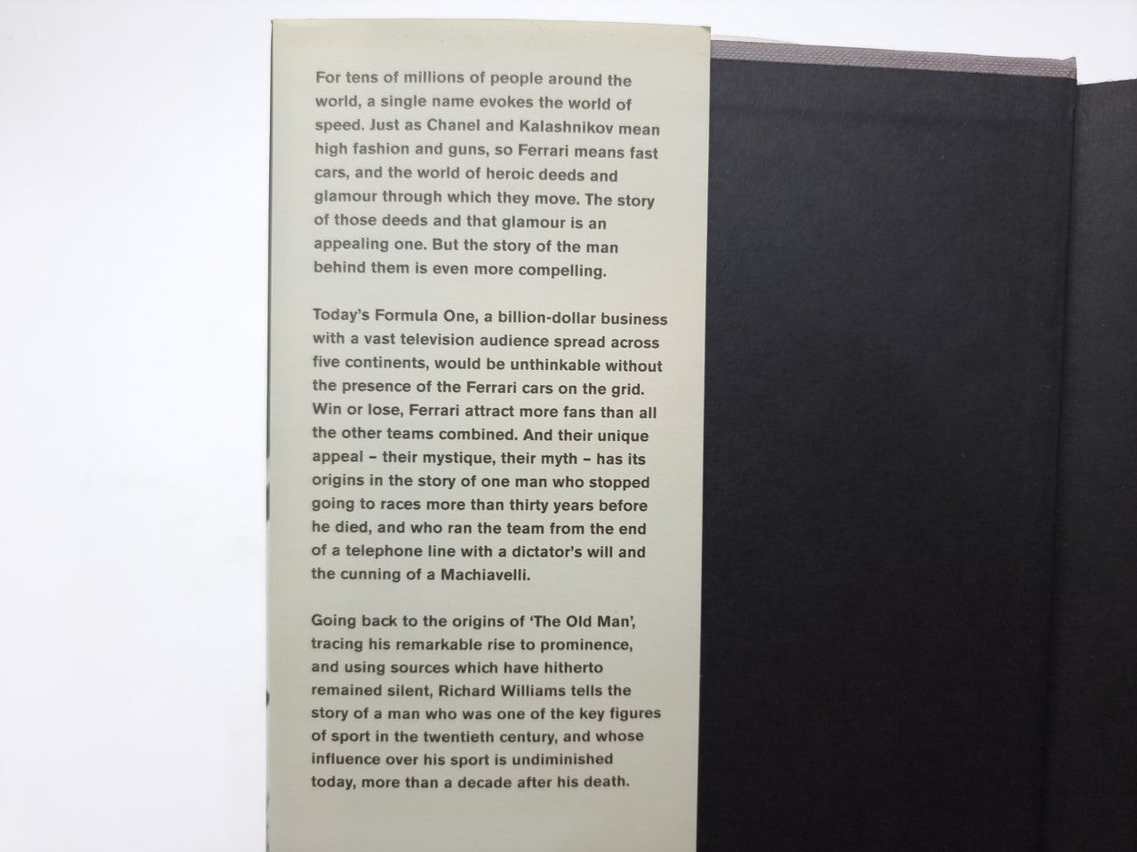 Close-up of printed text on an open book page with paragraph formatting