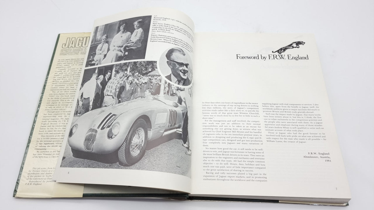 Jaguar sports racing book, open pages with black-and-white car photos and article text