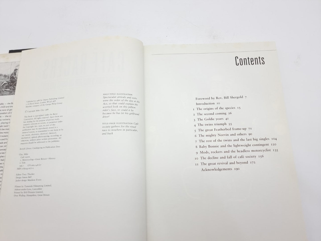 Open paperback book showing the Contents page on the right with listed sections
