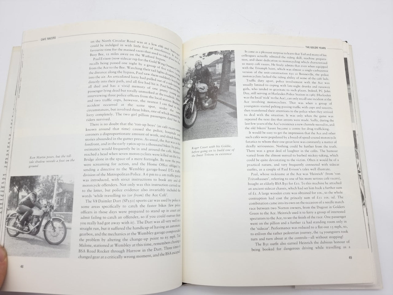 Open paperback book spread with paragraphs of text and multiple motorcycle photos