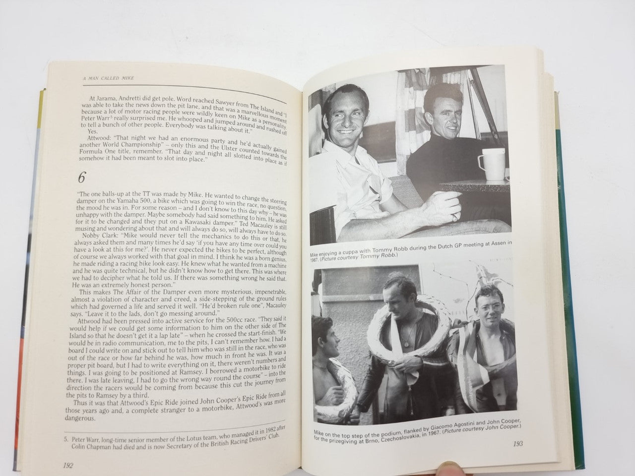 Book open to a photo spread with two portrait images and captions