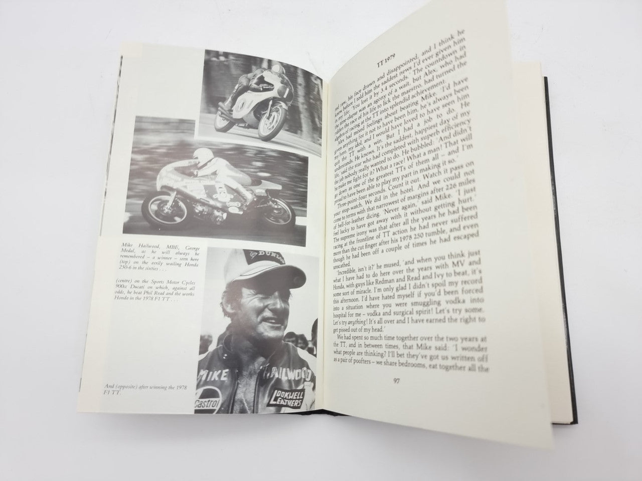Book open with black-and-white photos on the left and text on the right.