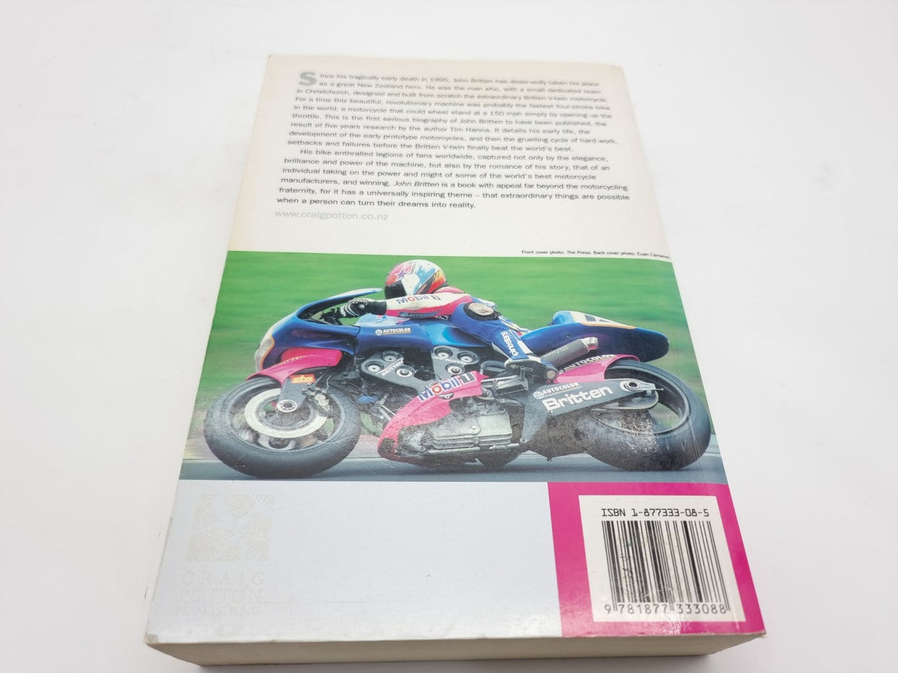 Hardcover book back cover with motorcycle photo and barcode label