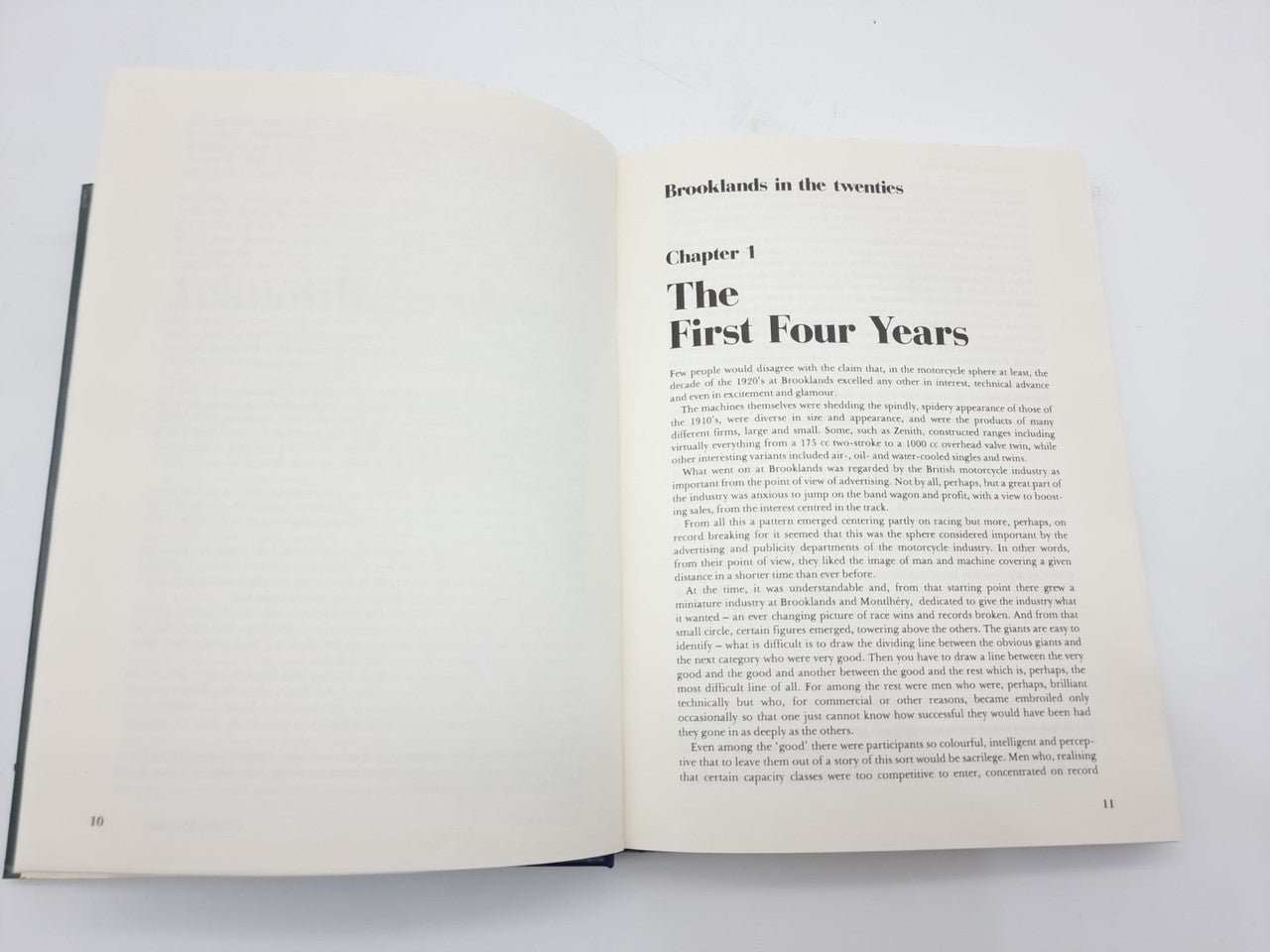 Open book spread with chapter title “The First Four Years” and body text blocks.