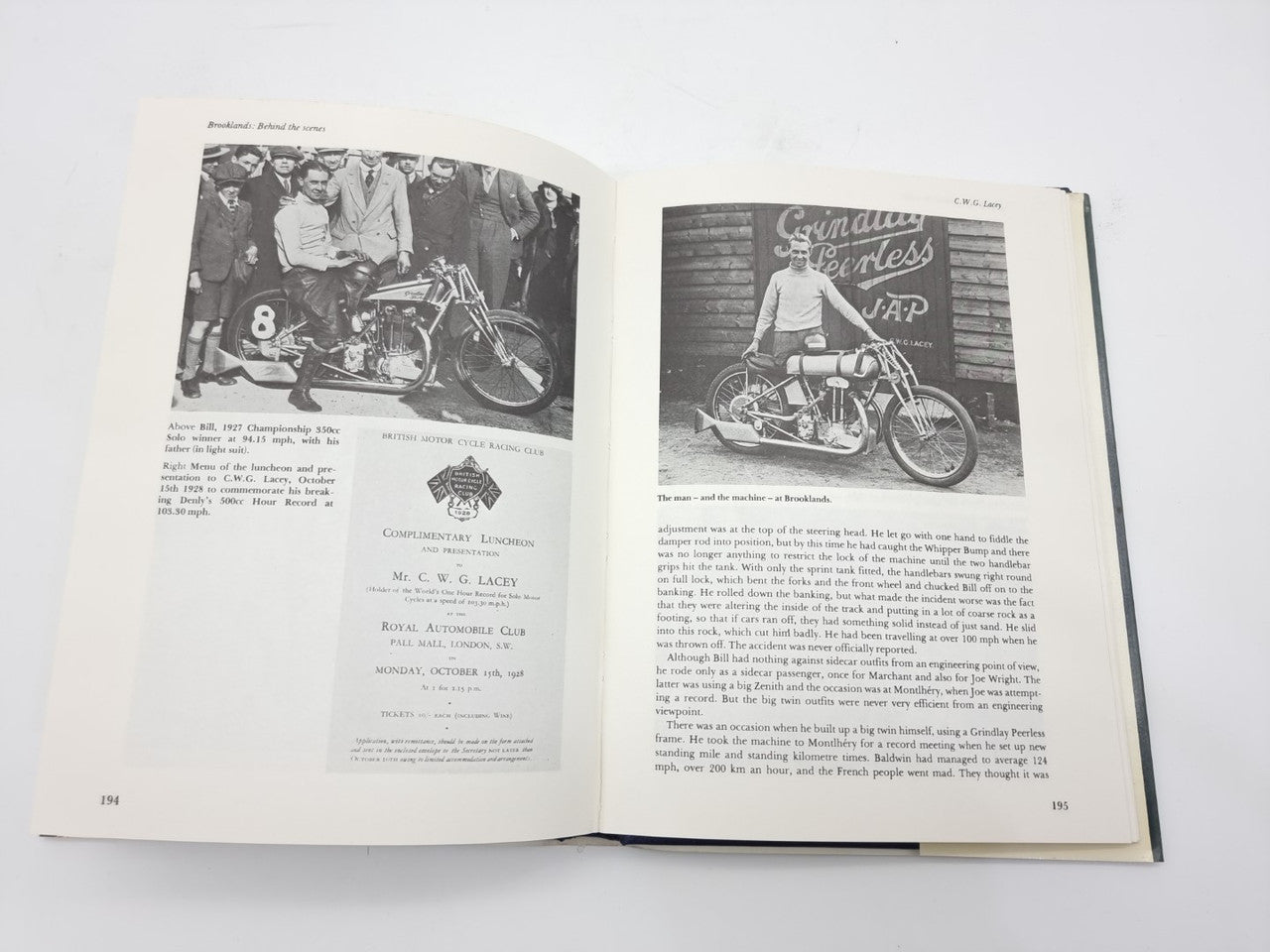 Open paperback book with printed text and black-and-white motorcycle group photo