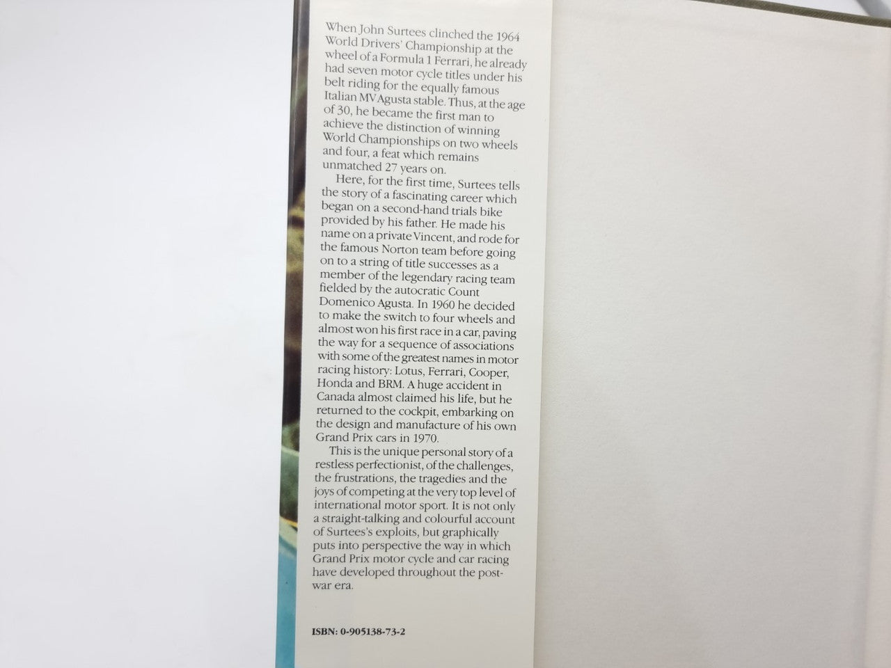 John Surtees World Champion book text page with ISBN and tightly set paragraphs