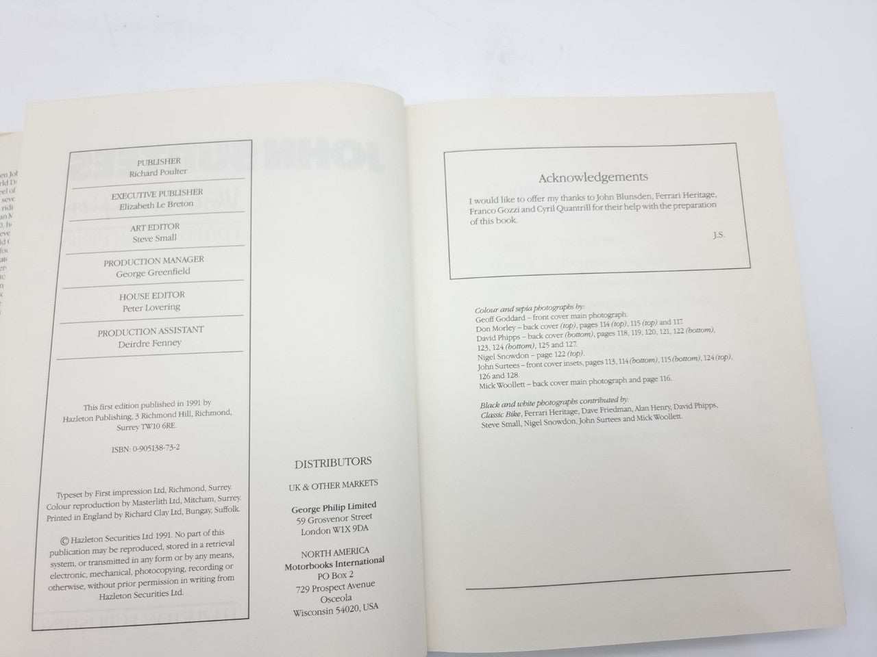 John Surtees World Champion book open to acknowledgments and credits pages