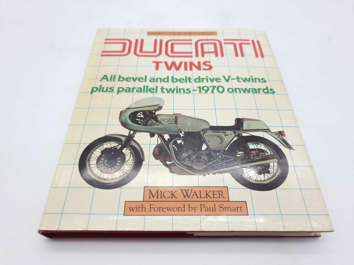Motorcycle repair book with illustrated Ducati Twins cover