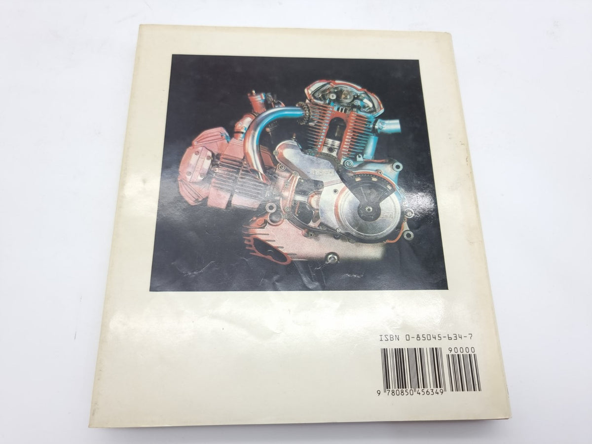 Motorcycle repair book back cover with engine photo and barcode