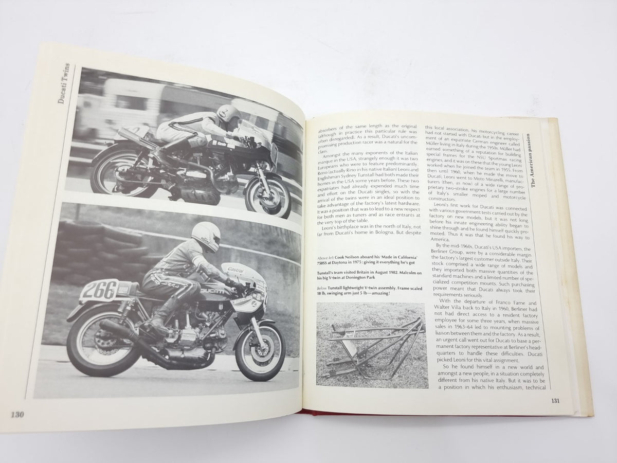 Open book spread with grayscale motorcycles and dense text paragraphs