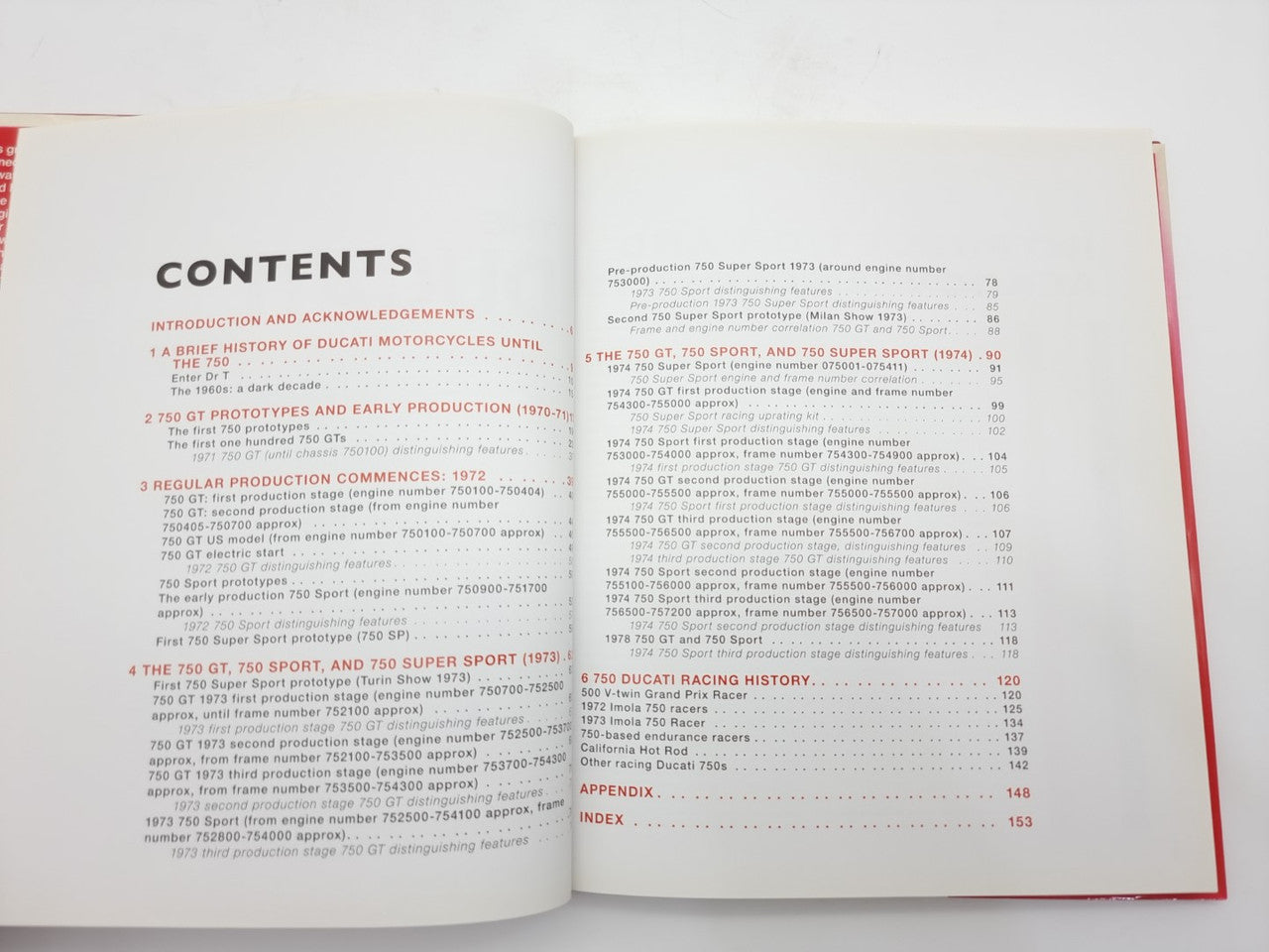 Motorcycle guide book open to contents page with chapter list