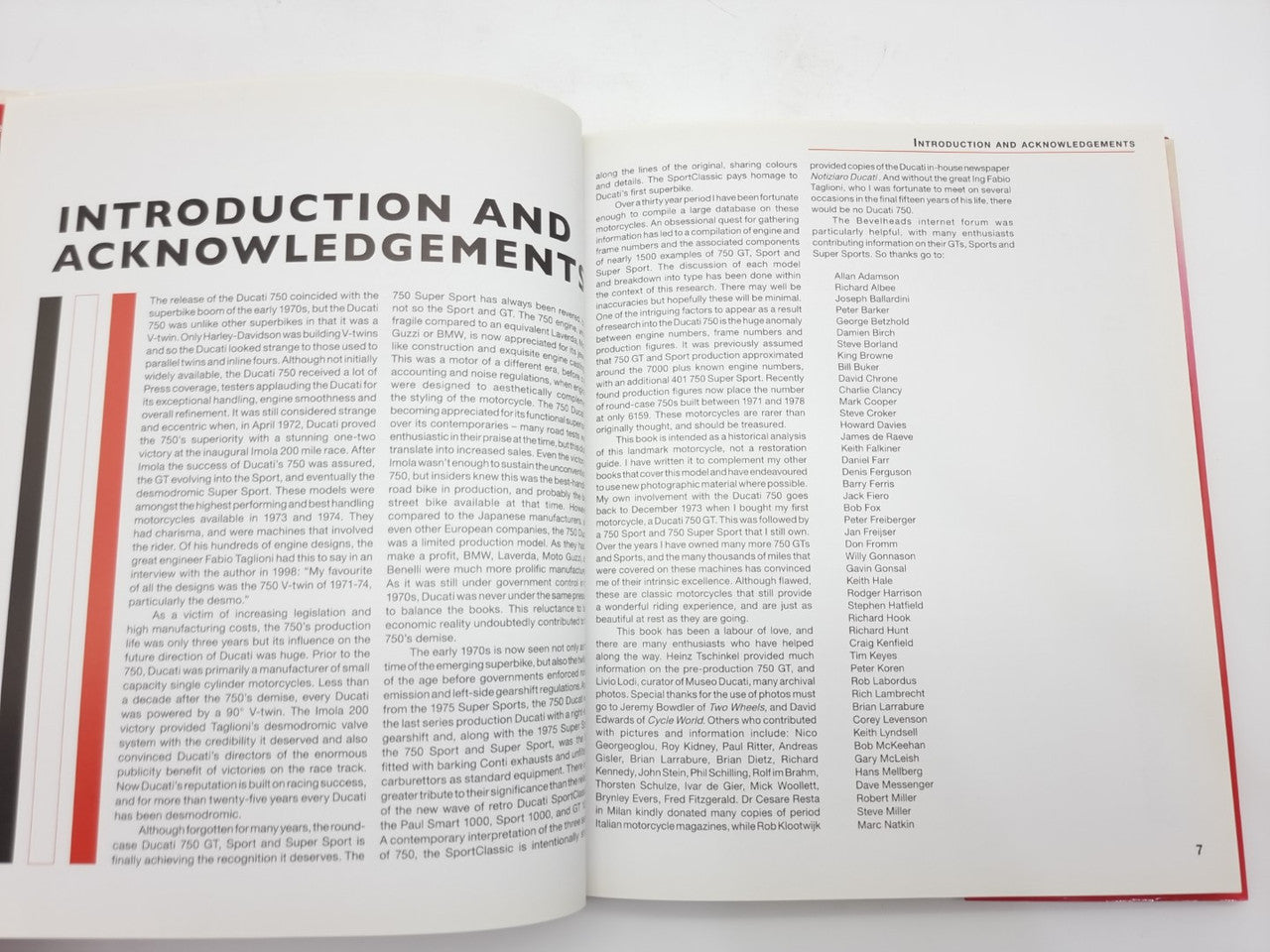 Motorcycle guide book open to introduction and acknowledgements pages