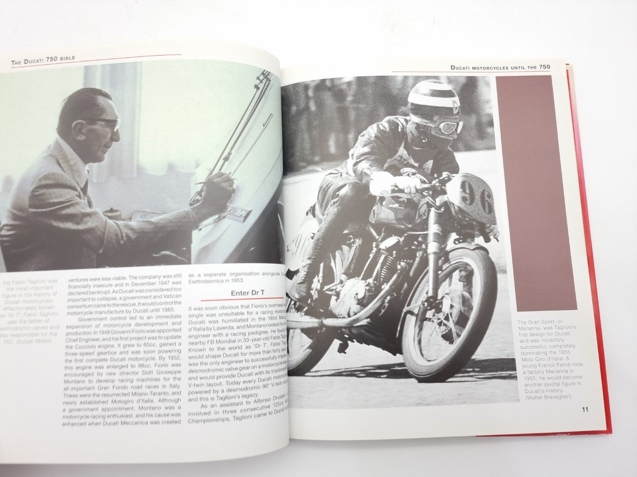 Open motorcycle history book showing black-and-white rider seated on a motorcycle