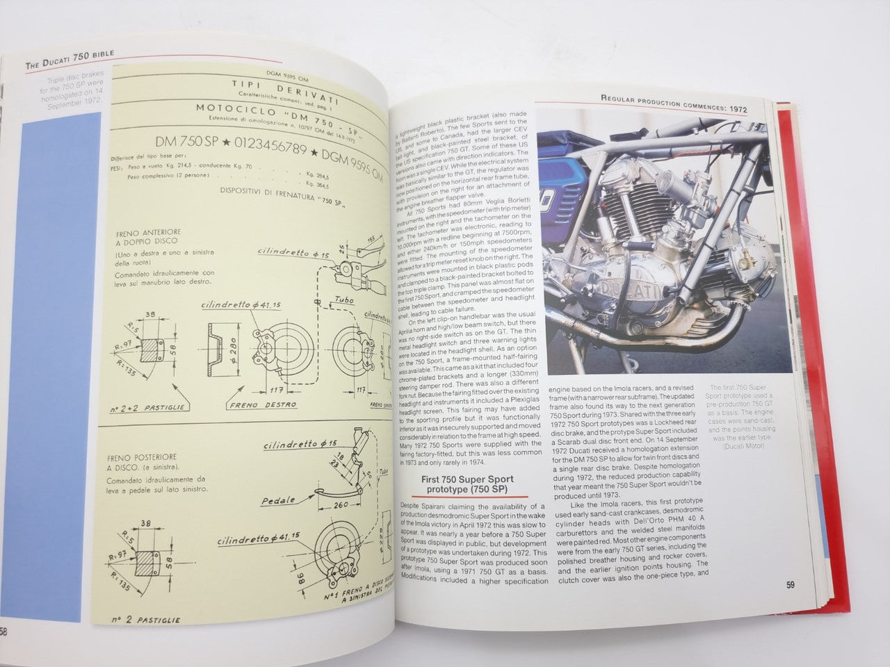 Open motorcycle history book with technical diagrams and engine photo on the right page