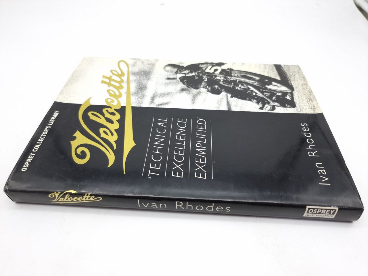 Hardcover motorcycle history book with Velocette logo on the cover and spine