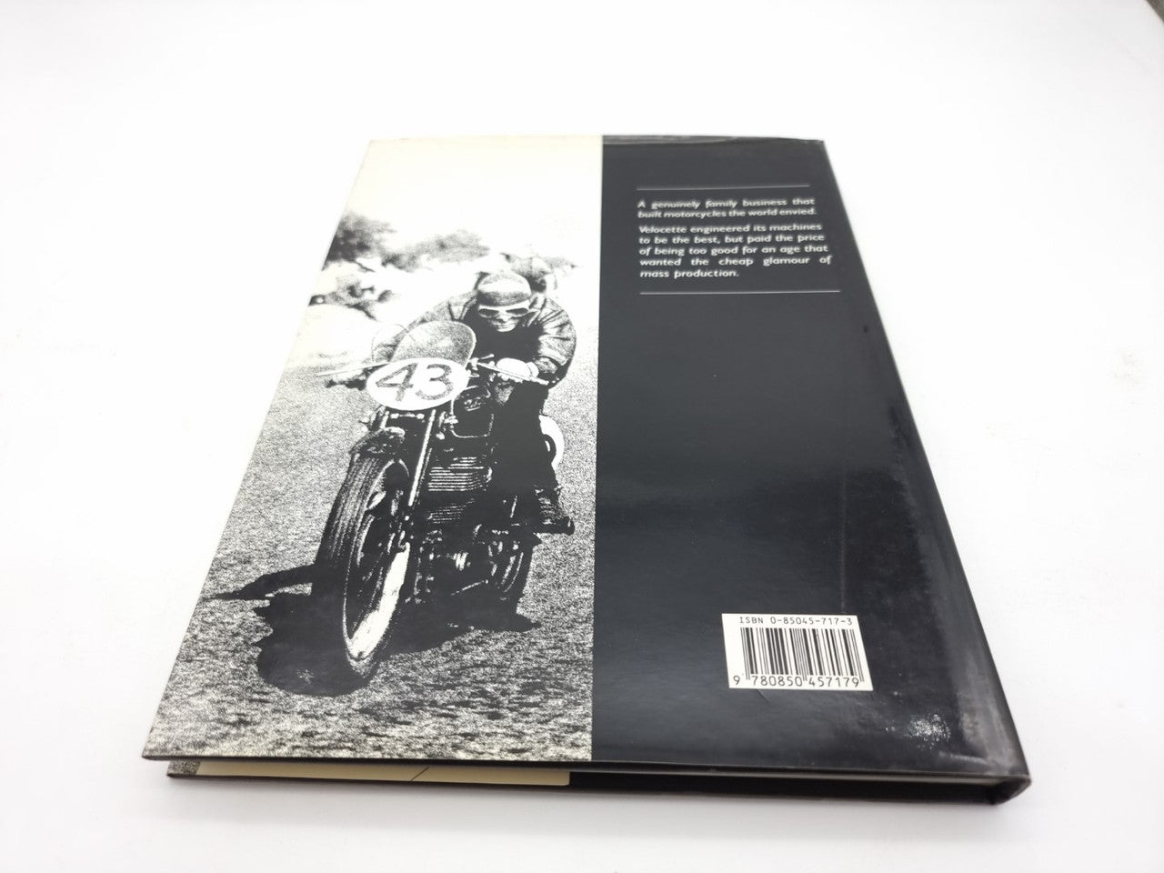Hardcover book back cover with black-and-white motorcycle rider image and barcode