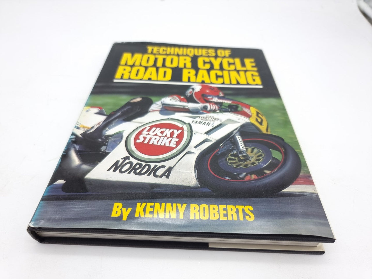 Motorcycle road racing book with illustrated cover and bold title by Kenny Roberts