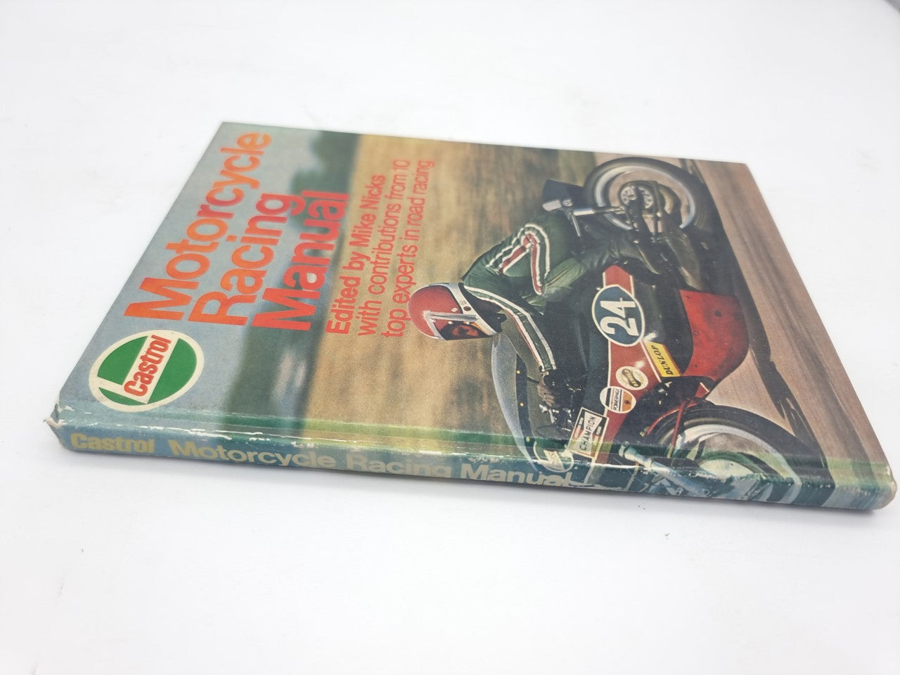 Motorcycle racing manual cover with green text and a racing bike illustration