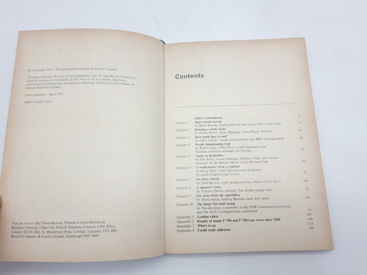 Open motorcycle racing manual showing contents page with section titles and page numbers