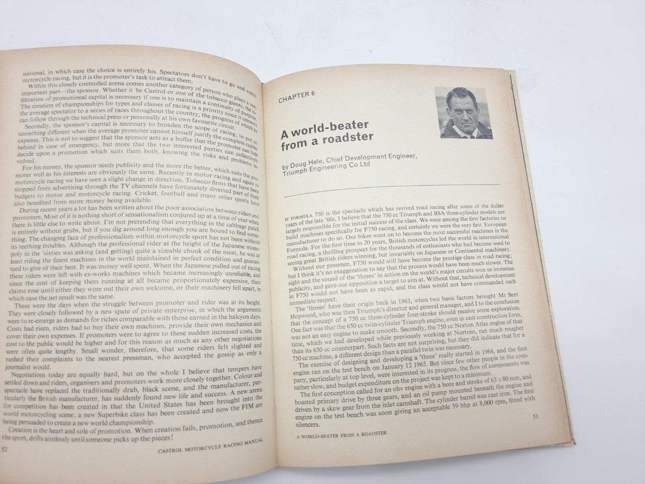 Open motorcycle racing manual showing “A world-beater” chapter heading and text with portrait