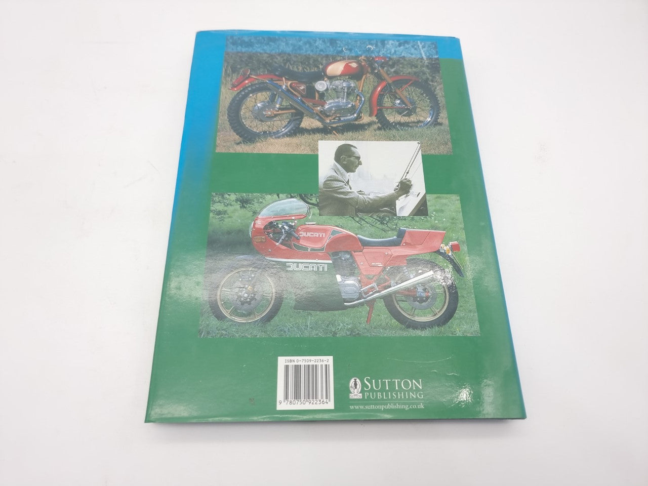 Motorcycle history book cover with red sport bike and Sutton Publishing badge